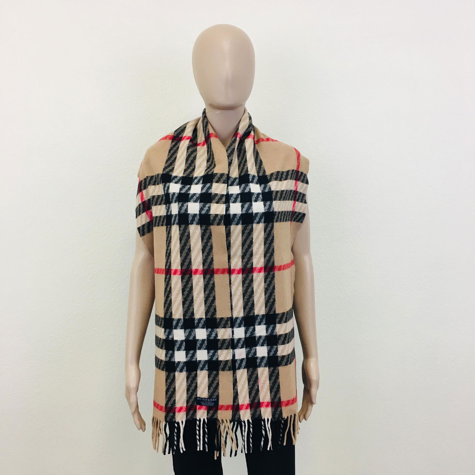 Burberry 100% Lambswool Scarf: 100% Lambswool Color: Camel Brown Measurements: Length : 182 cm / 71.5 in. Width : 30 cm / 12 in.