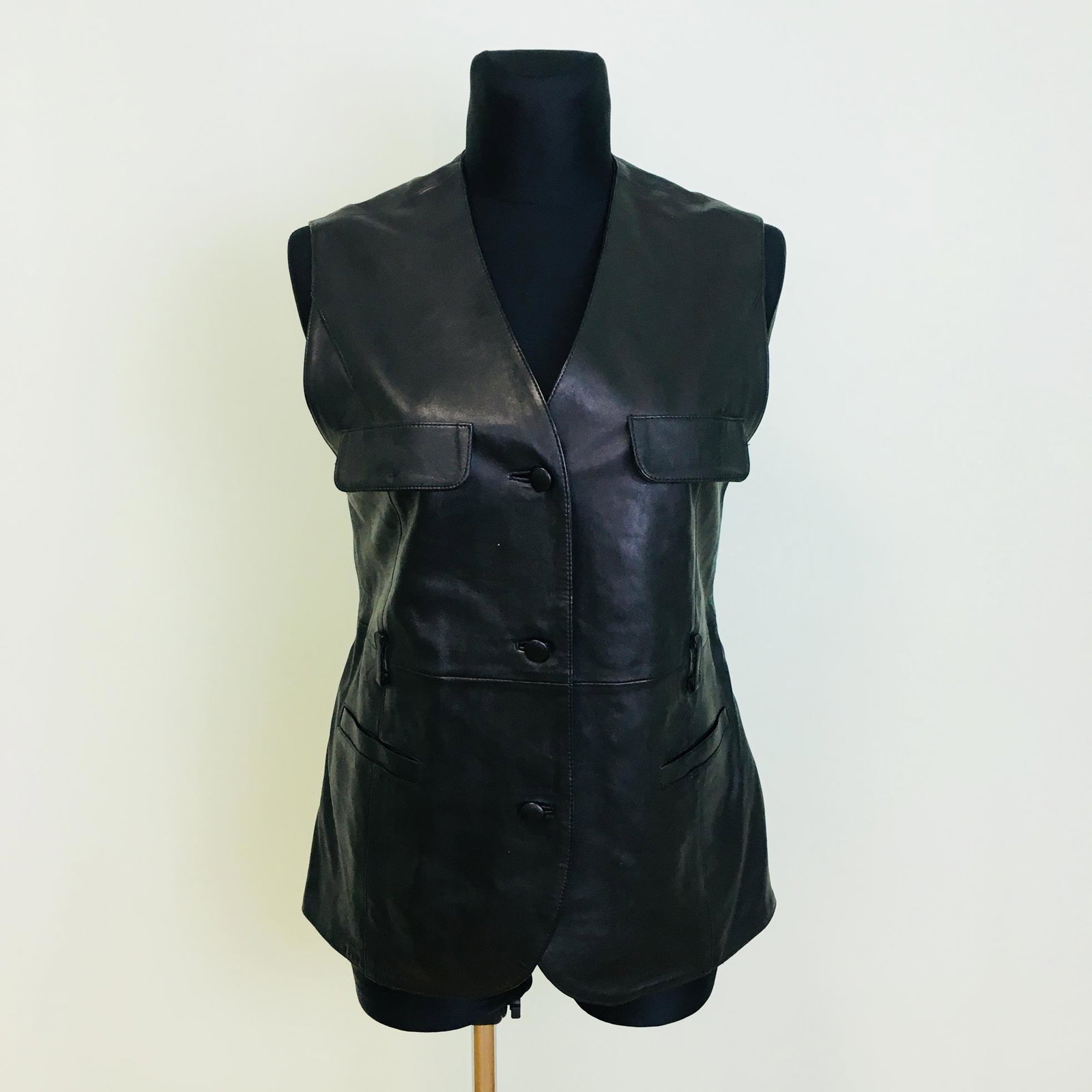 Vintage Women's Suede Leather Black Vest Waistcoat: Size EUR 42 US 12 Vintage 100% Real Leather Lining: 100% Satin Armpit to Armpit: 20 in. Total length: 27.5 in.