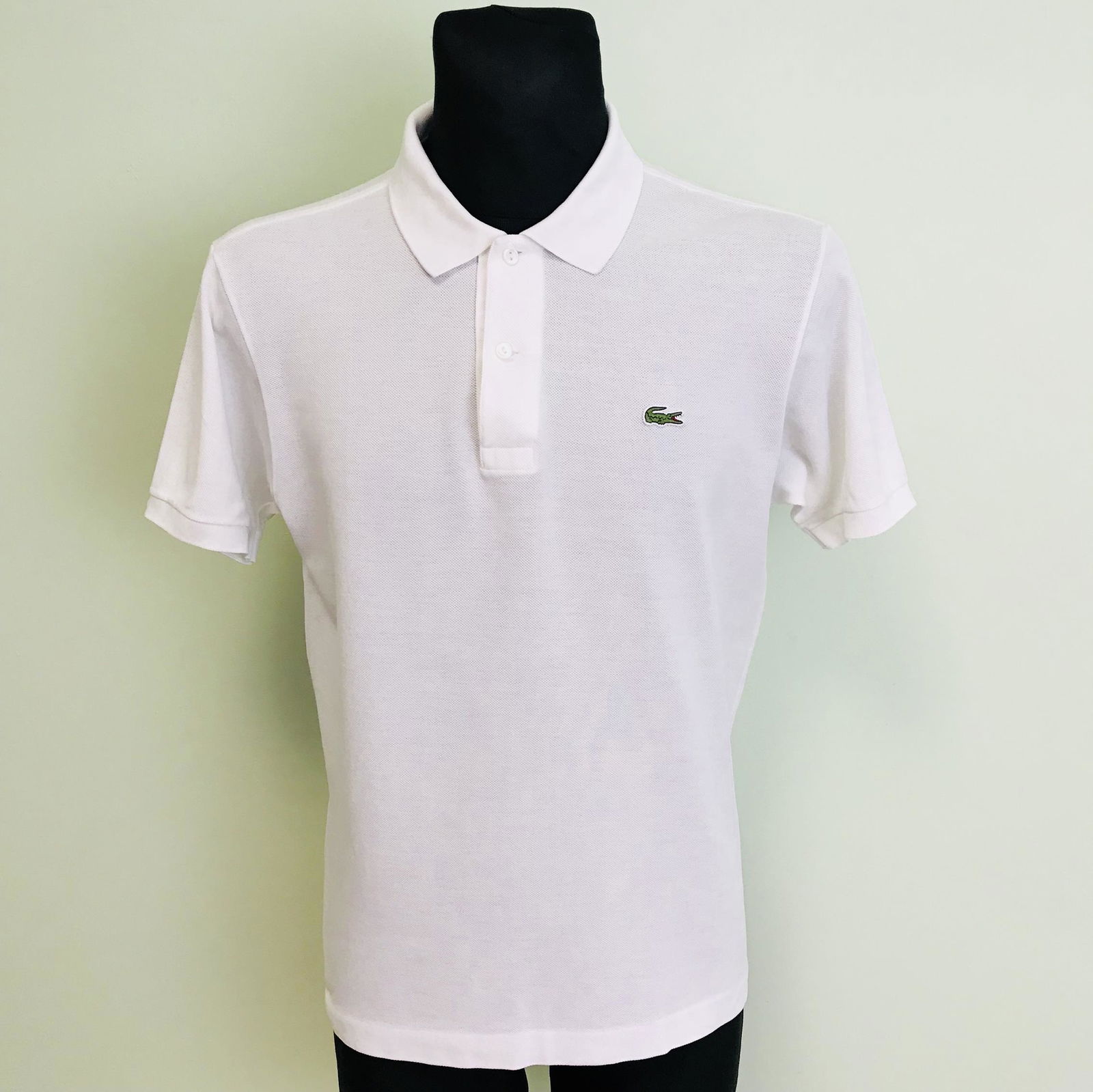 Men's Lacoste White Polo Shirt: Size 4 / Medium Cotton Armpit to Armpit: 21 in.