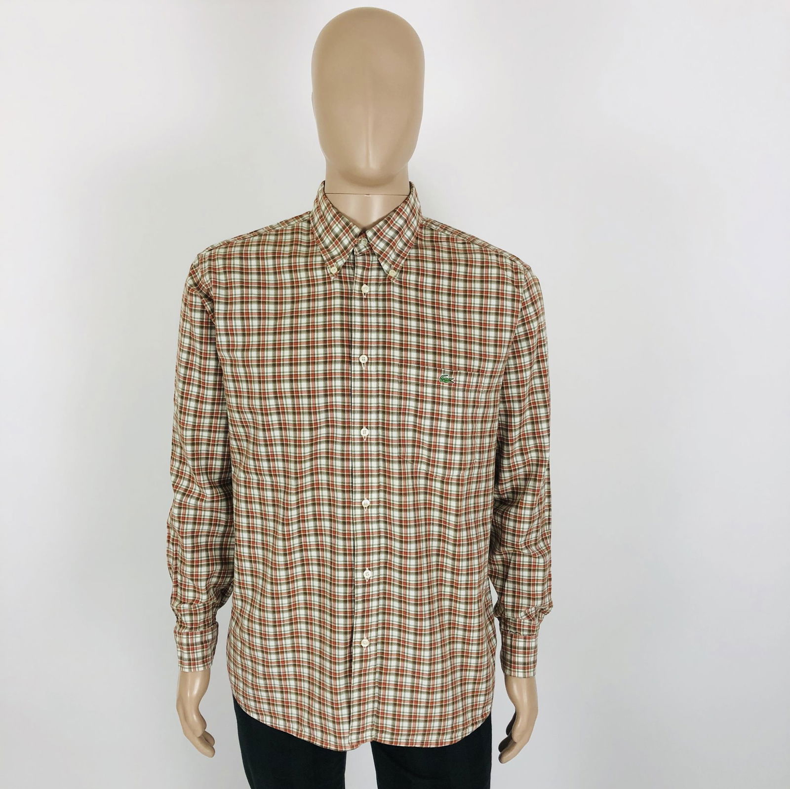 Vintage Men's Lacoste Sport Shirt Size 41: Size EUR 50 US 40 100% Cotton Armpit to Armpit: 25 in. Sleeve from shoulder seam: 25 in. Shoulder to shoulder: 19.5 in. Total length: 32.5 in.