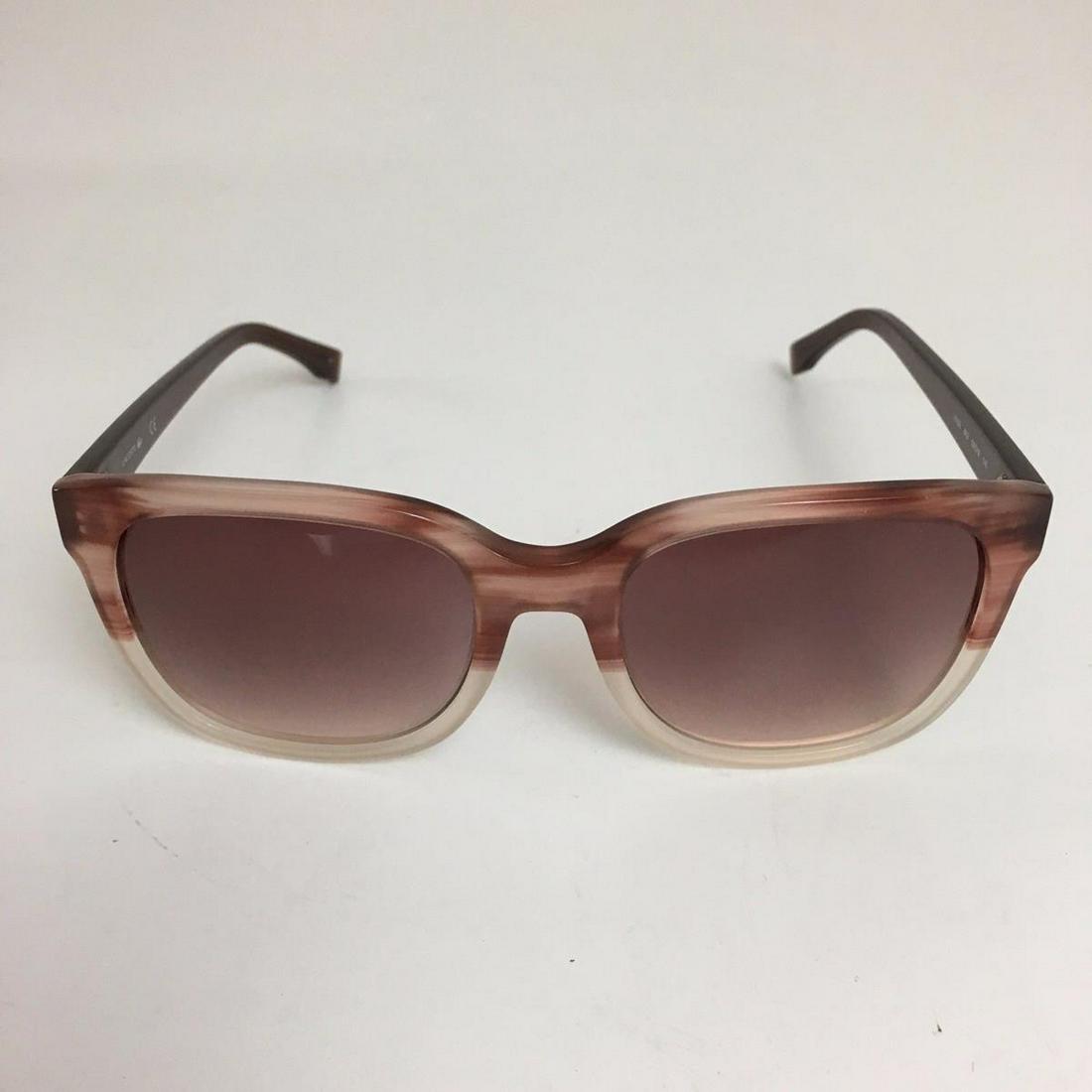 Lacoste Ladies Sunglasses: Temples length: 140 mm Lenses diameter: 55 mm Bridge width: 19 mm Frame: acetate Color - Light Brown Frame: acetate Temples length: 140 mm Lenses diameter: 55 mm Bridge width: 19 mm UV protection Orig