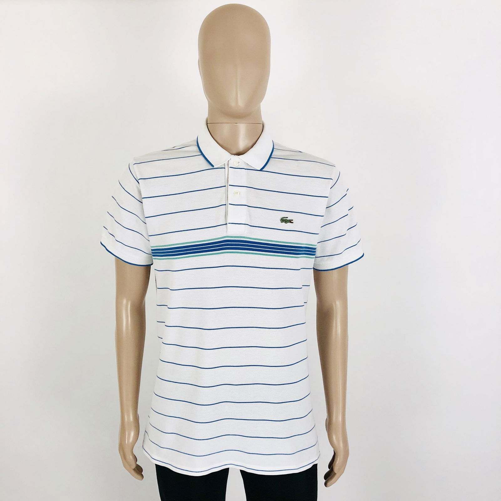 Vintage Men's Lacoste Polo Shirt L: Size Large (L) 100% Cotton Armpit to Armpit: 22.5 in. Shoulder to shoulder: 18.5 in. Total length: 29 in.