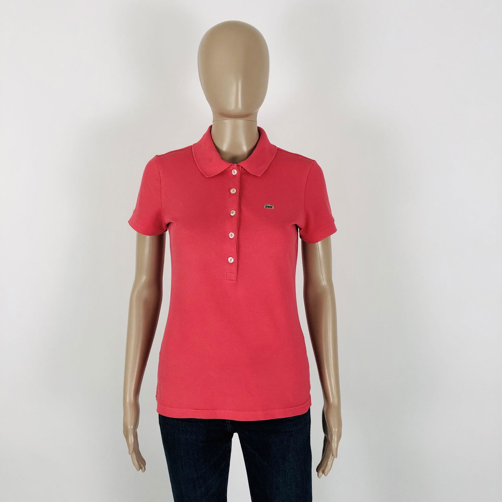 Women's Lacoste Pink Polo Shirt US 10 EUR 40: Size EUR 40 US 10 Armpit to Armpit: 17.5 in. (Has stretch) Shoulder to shoulder: 15 in. Total length: 23 in.