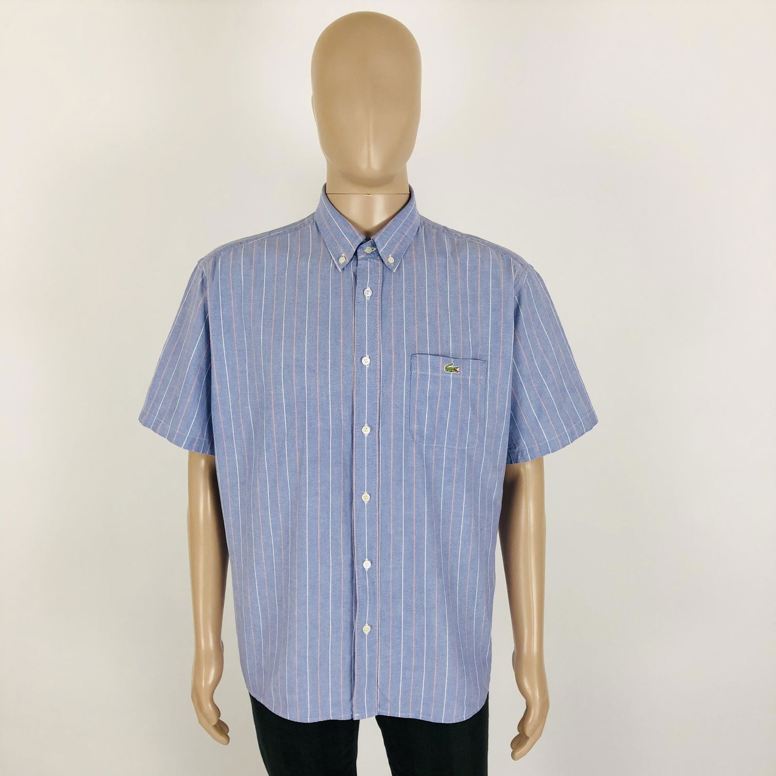 Vintage Men's Chemise Lacoste Blue Shirt: Size 43 / XLShort sleevedArmpit to Armpit: 26 in. / 66 cmShoulder to shoulder: 21 in. / 53.5 cmTotal length: 31 in. / 78.5 cm