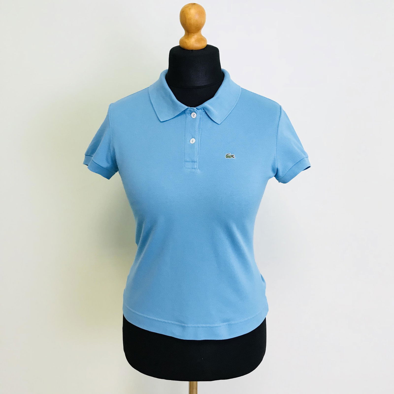 Women's Lacoste Designer Polo Shirt: Size EUR 42 US 12Armpit to Armpit: 18.5 in.