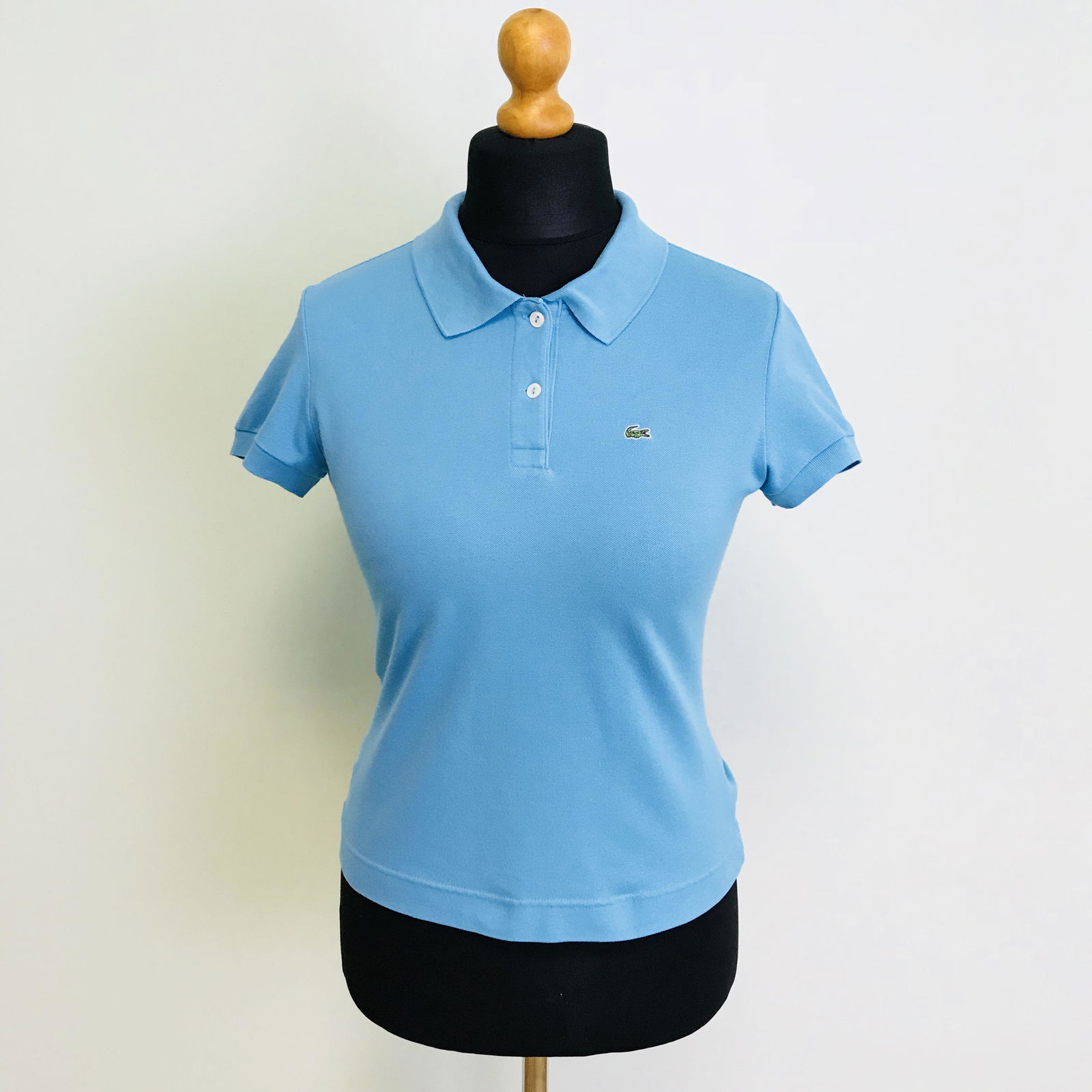 Women's Lacoste Designer Polo Shirt: Size EUR 42 US 12Armpit to Armpit: 18.5 in.