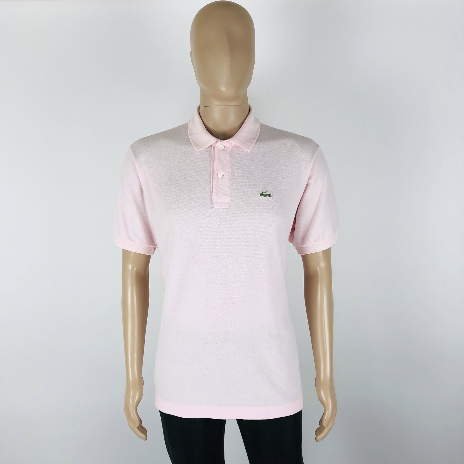 Men's Lacoste Polo Shirt: Size 5 (Large)Armpit to Armpit: 23.5 in.Shoulder to shoulder: 20 in.Total length: 30 in.