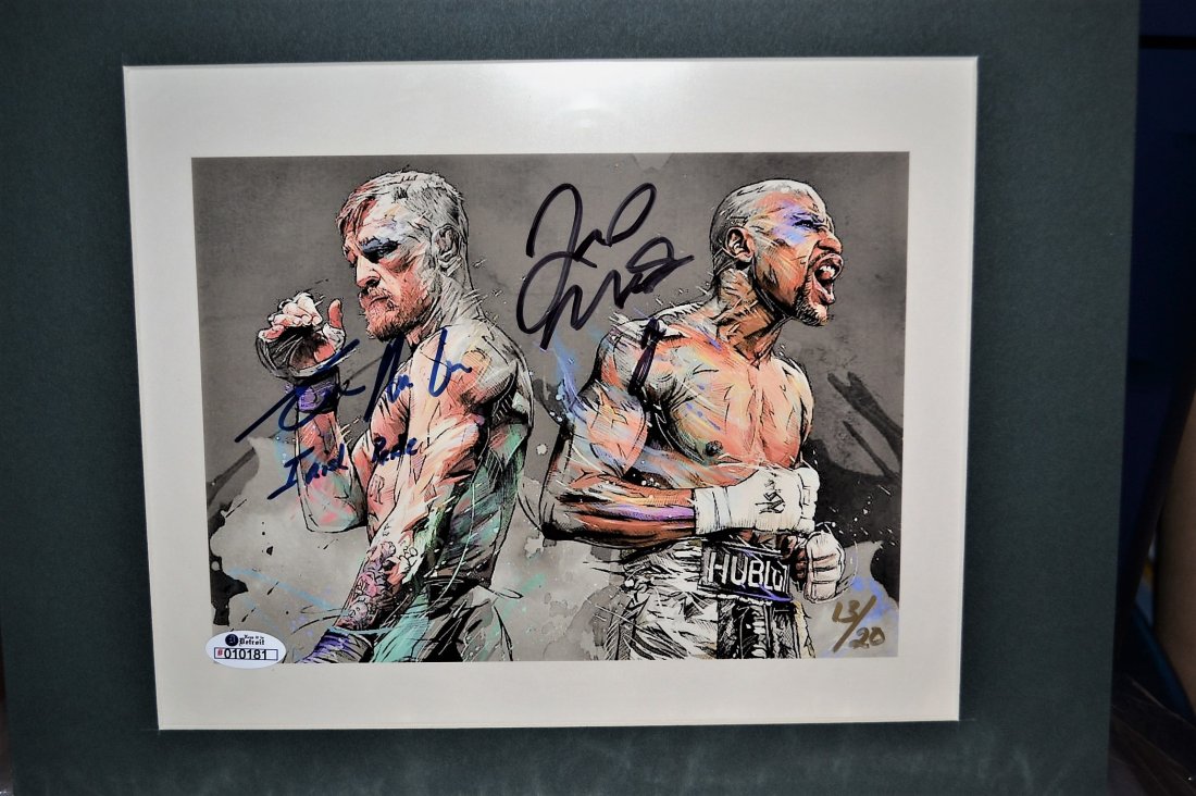 Conor Mcgregor and Floyd Mayweather Autograph Photo.: in person limited edition sign by ufc star Conor mcgregor and boxing star Floy Mayweather, limited edition 13 of 20 sign... very nice hard to get...VERY Rare Piece , will be insured shipping... all au
