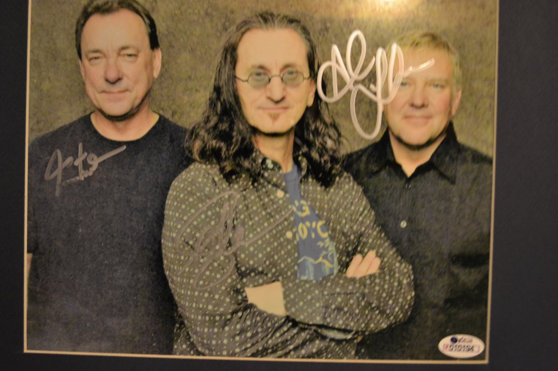 Rush Sign Photo, Rush Autograph Photo, Rock and Roll: fantastic in person sign photo by Rush.. sign by Geddy Lee , alex lifeson, and neal Pert one of the greatest bands ever .. very cool to us and charity.. any flash you see is not on the photo but in ca