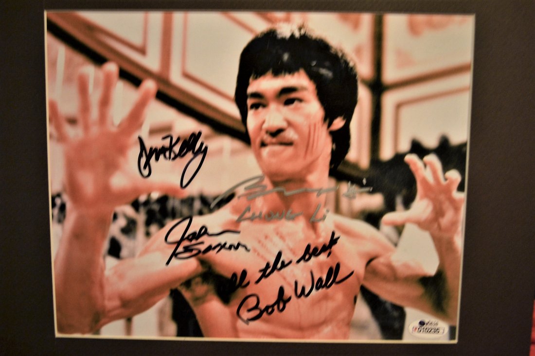 Bruce Lee Game of Death cast sign Photo: this is a great image of bruce lee this is hand sign by,,,Bob Wall , john saxon , jim Kelly , bolo yang , Bruce lee did not sign this... only the cast .. great photo 11 x14 size All items will be ship