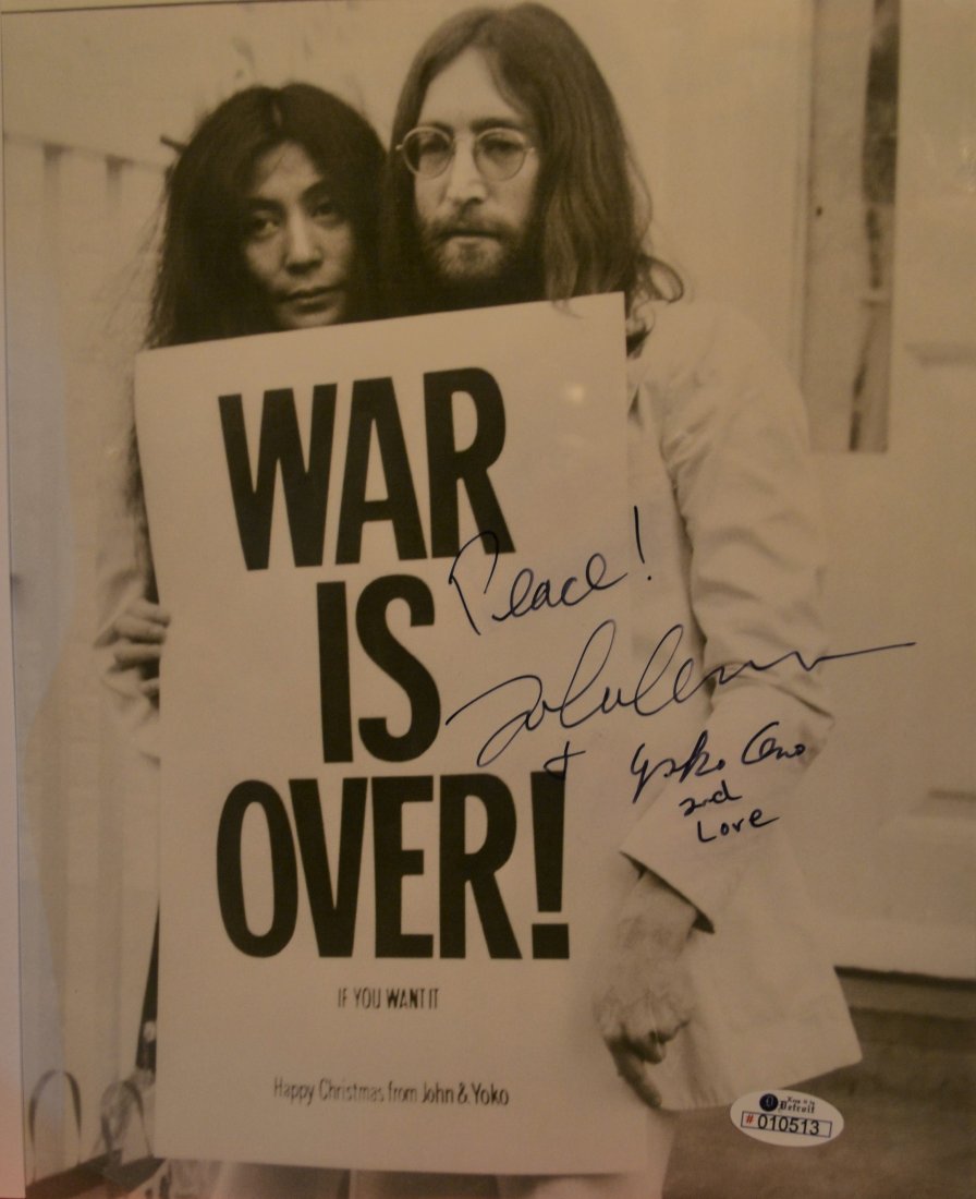 John Lennon Autograph Photo , John Lennon Sign Photo: Awesome very rare sign transparency film file photo sign by John Lennon and Yoko Ono this is a rush sign signature , J is consistant and Lennon looks rushed but very consistant to rushed on street sig