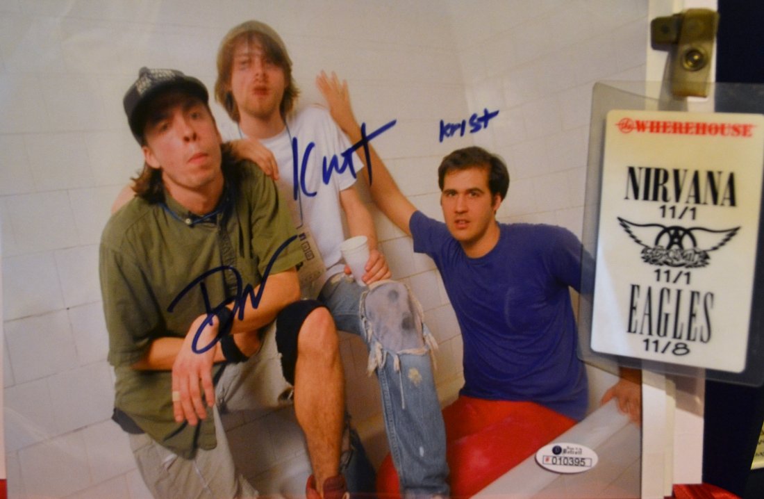 Nirvana Sign Photo , Nirvana Autograph and Pass: Awesome very rare sign Nirvana Band with pass , this was from 1993 Hollywood concert and pass from producer friend in Hollywood this is very rare and very sought after. Kurt , Dave and Krist .. you ge