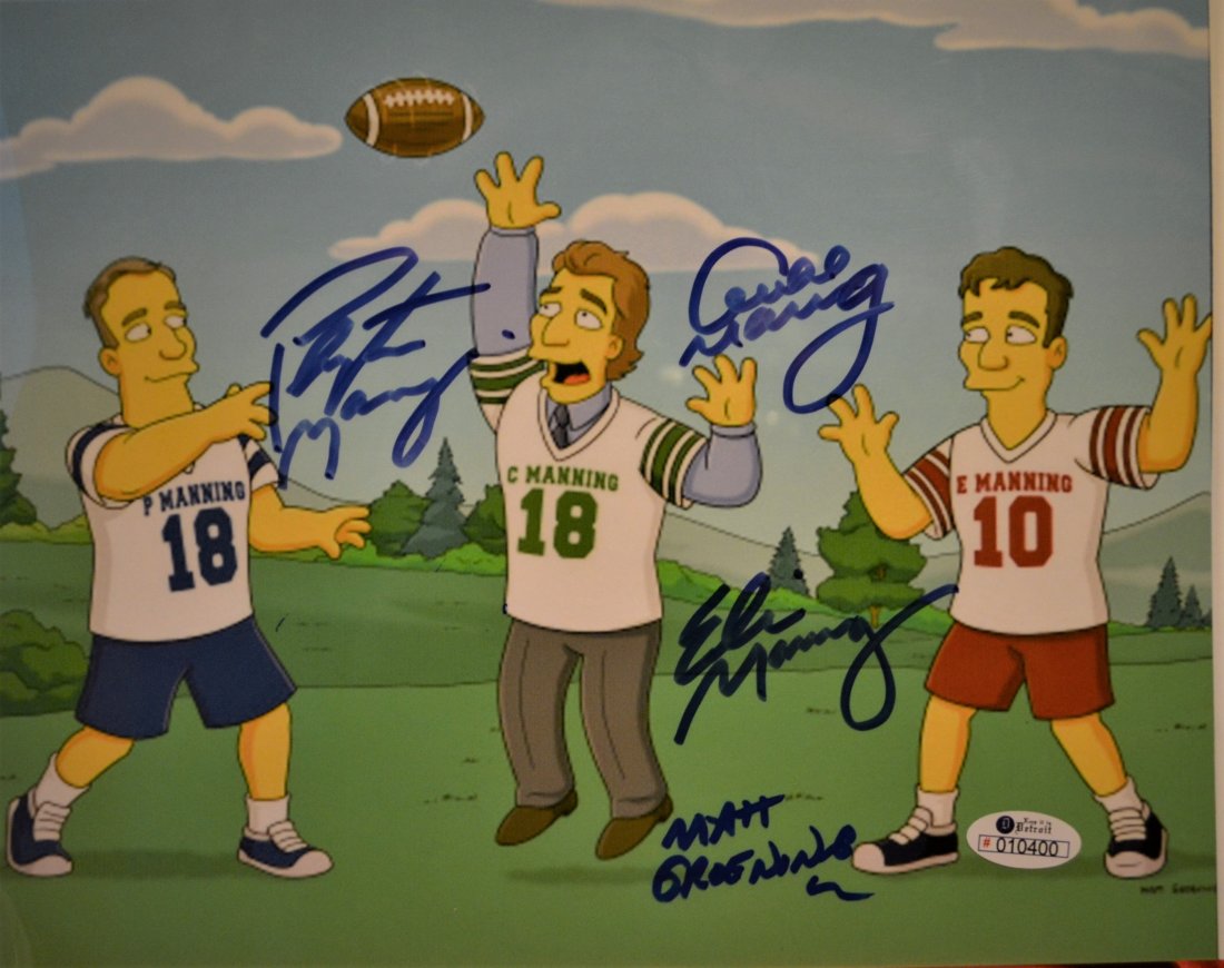 The Mannings Simpsons Autograph , Payteon Manning Sign: Awesome very rare Simpsons transparency film cell Autograph by the Manning brothers , Payton , Eli and Cooper and Gorening we have never seen another one for sale these are very rare... these sign pri