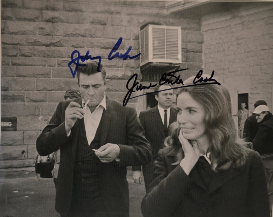 Johnny Cash Autograph Photo June Carter Cash: Awesome very rare Folson prison transparency film photo of this iconic time in music . Autograph by Johnny Cash and June Carter Cash rare photo sign by these two .. This is a great Photo sought after 
