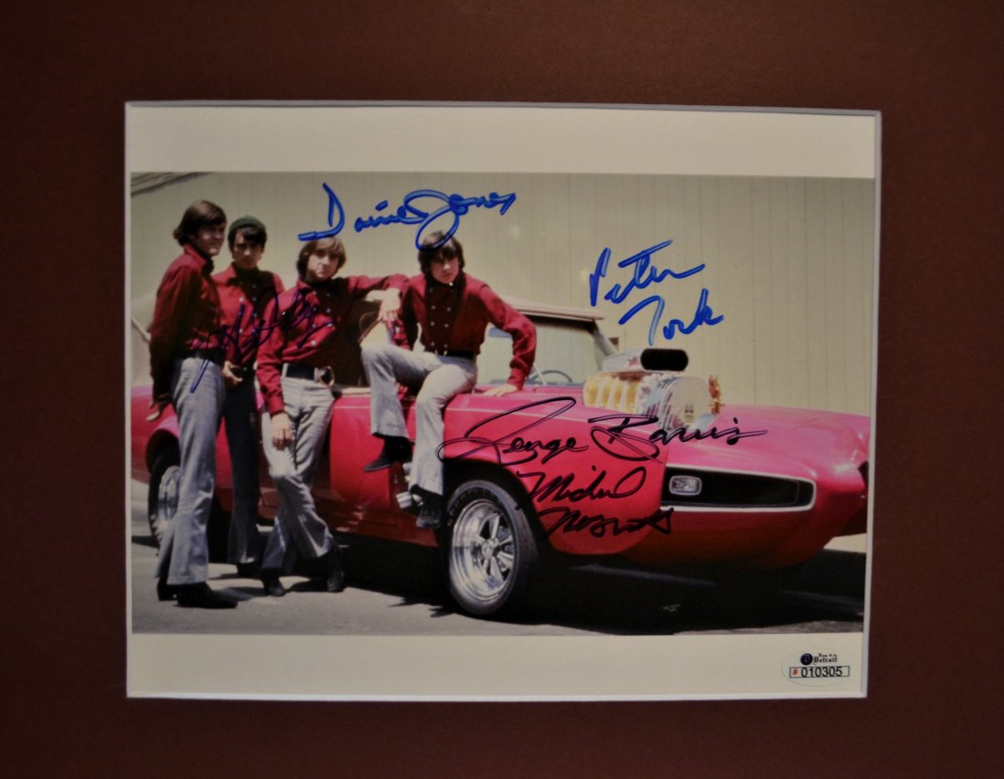 The Monkeys Autograph George Barris Sign Photo: Very nice autograph The Monkeys and George Barris , this beautiful photo is sign by The Monkeys , Mickey , Peter , Davie and Mike and car creator George Barris , beautiful item Absolute beautiful sign