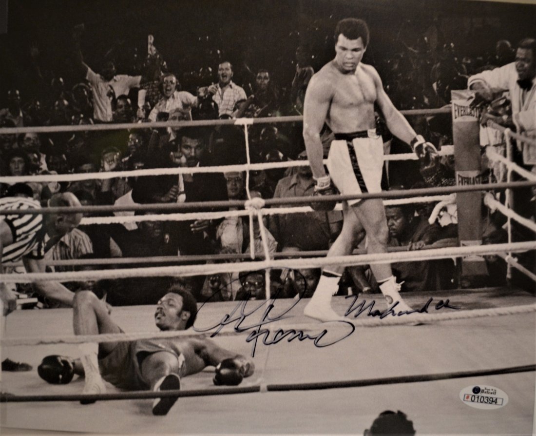 Ali vs Foreman Autograph Photo , Ali Sign Photo: Very nice Autograph Phot of Ali vs George Foreman , awesome shot sign by both of these Legends Absolute beautiful sign photo … you could not get this any longer and a must have all items are for cha