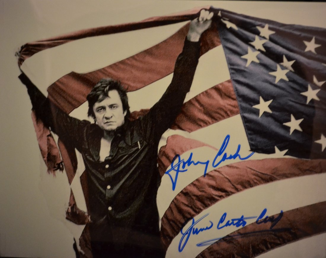 Johnny Cash Sign Photo , Johnny Cash Autograph Photo: Very Rare Autograph Photo of Country icon Johnny Cash and June Carter, this rare this old Flag Sign Photo is beautiful sign by bothAbsolute beautiful sign photo you can not get this any longer and a m