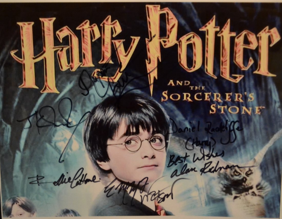 Harry Potter Autograph Cast Photo , Harry Potter Sign: Very Rare Autograph Photo of the cast of Harry Potter , this rare photo is sign by JK Rowling, Emma Watson , Daniel Radcliff , Alan Rickman , and a few others, great piece very hard to get nowAbsolute