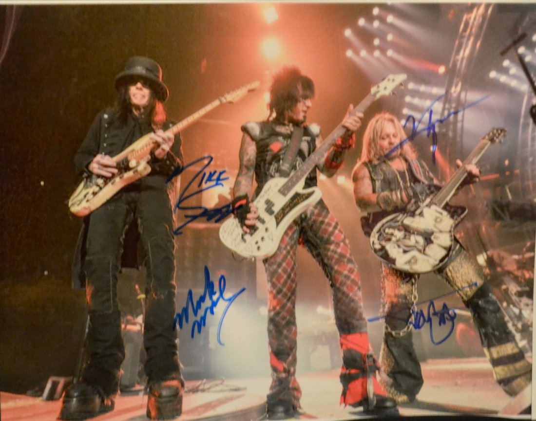 Motley Crew Autograph Photo , Motley Crew Vince Neil: Very Rare Autograph Photo of motley crew , this awesome photo is sign by all 4 , Tommy, Vince, Nikki and Mick great on stage shot Absolute beautiful sign photo you can not get this any longer and a mu