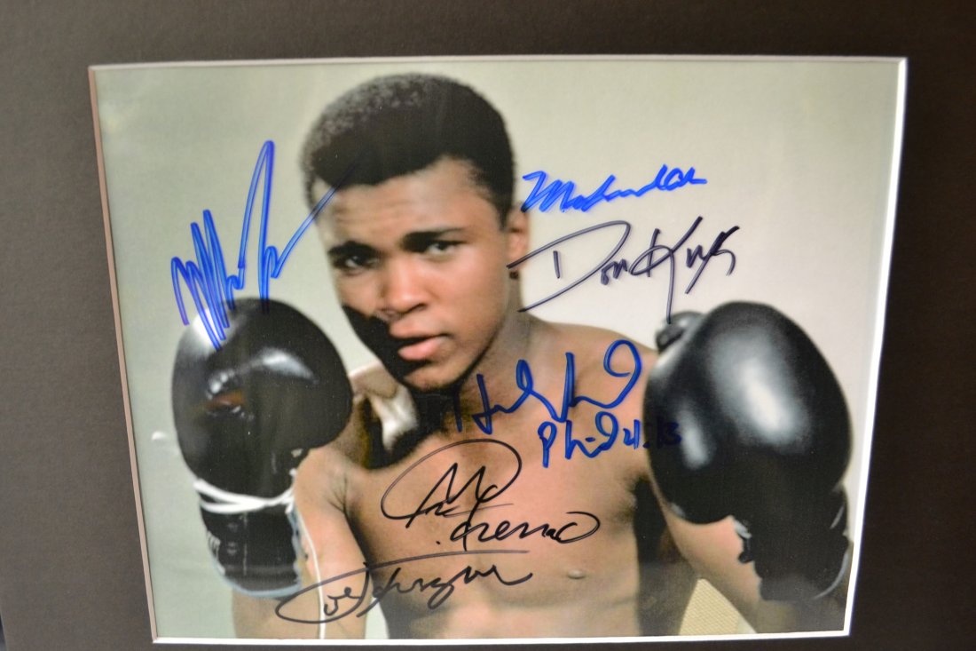 Boxing Greats , Heavy Weight Autograph Photo Ali Sign: Very Rare Autograph , this is a beautiful very tough autograph photo is sign by Ali, Mike Tyson , Big George Foreman , don king, holyfield and frazier . very rare Absolute beautiful sign photo you can
