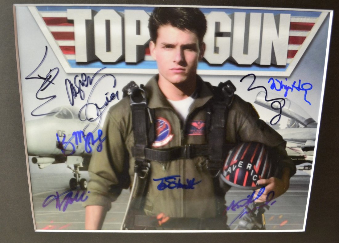 Top Gun autograph cast photo , top gun Sign Photo: Very Rare Autograph , this is a beautiful very tough autograph photo is sign by the cast tom cruise , goose , kelly mcquire and many more , super rare Absolute beautiful sign photo you can not get thi