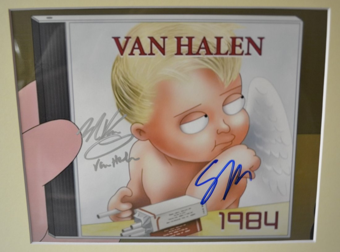 Family Guy Van Halen Autograph, Van Halen Family Guy: Very Rare Autograph, this is a beautiful very tough autograph photo is sign by seth mcfarlane and eddie van halen. super cool piece Absolute beautiful sign photo you can not get this any longer and a 