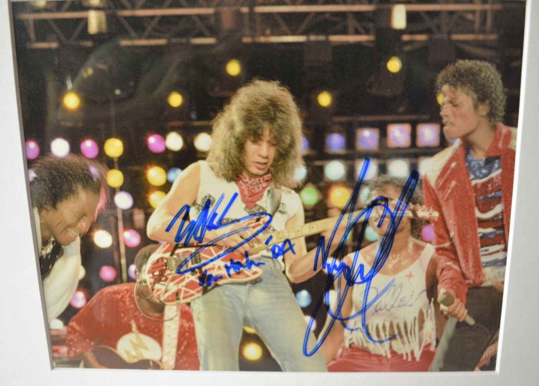 Eddie Van Halen , Michael Joackson Autograph Beat It Ph: Very Rare Autograph, this is a beautiful very tough autograph photo is sign by EDDIE VAN HALEN AND MICHAEL JACKSON, THIS IS A VERY SCARCE SIGN PHOTO OF THESE TWO SADLEY EDDIE PASSED. Absolute beautifu
