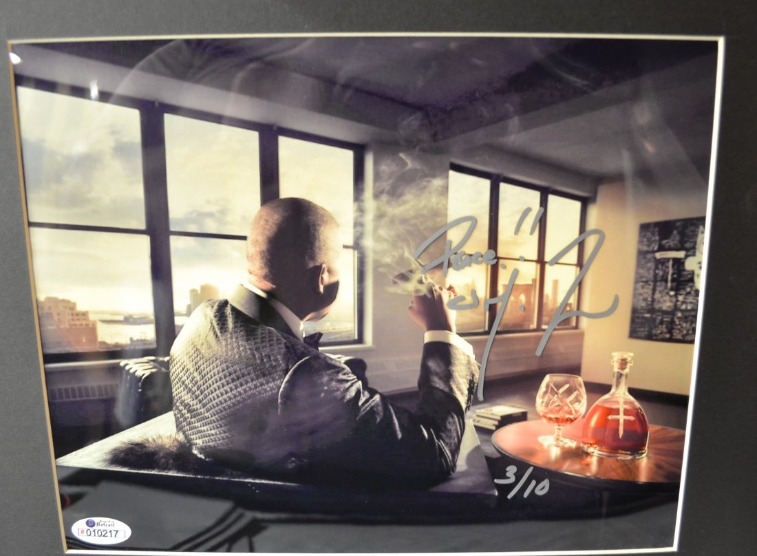 Jay Z Autograph Photo , Jay Z Sign Photo: Very Rare Autograph, this is a beautiful very tough autograph photo is sign by jay z this promo photo is of only 10 . this came with a D'Usse Cooler.. this is for the autograph photo only very nice Ab