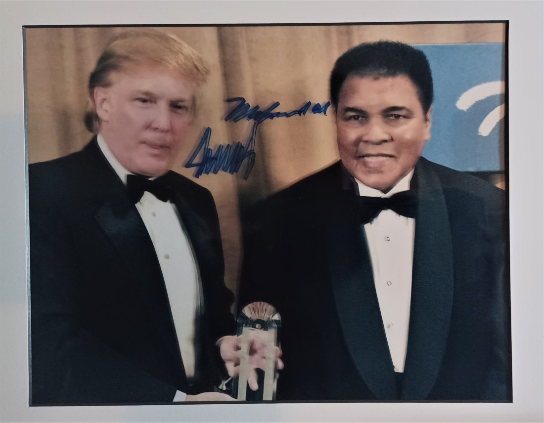 Muhammad Ali and Trump Autograph Photo: Very Rare Autograph , film transparency photos are sign by Muhammad Ali and D Trump Absolute beautiful sign photo you can not get this any longer and a must have all items are for charity in Detroit, 