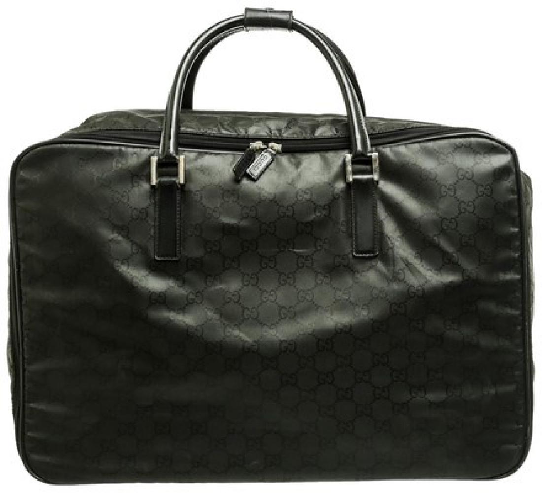 Gucci Soft Luggage: Gucci Monogram Leather Weekend/Travel Bag 24"L x 8.5"W x 16"H CONDITION Gently Used This item has visible signs of wear DESCRIPTION Brand: Gucci Style: Monogram Soft Luggage color: Black Materials: ny