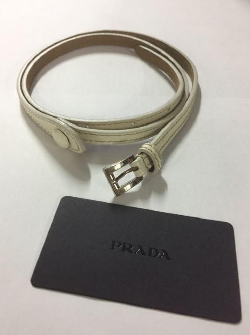 Prada women's slim boar leather belt/Cream/Cream: Brand: Prada Style: CINGHIALE SHOW Color: Cream/Cream Ladies Belt Made in Italy 100% Leather/Boar Size: 80 cm/28-29 waist size, 31.5"