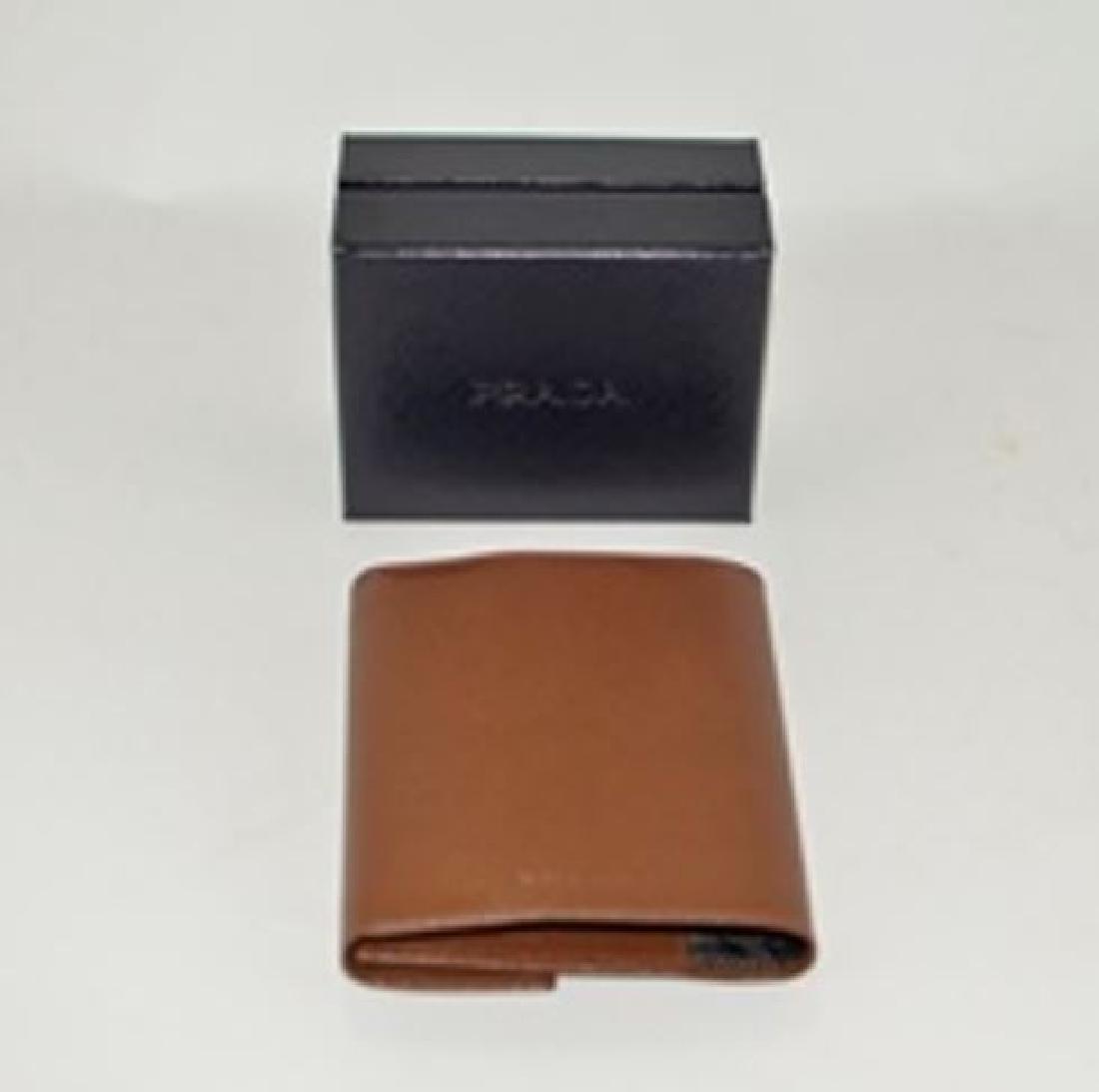 NEW Prada Tobacco calfskin agenda A20+A7: Brand: Prada NEW Color: Tobacco Style: Agenda A20+A7 SAFFIANO BASIC Materials: 100% calfskin Made in Italy Note: Does not include current calendar