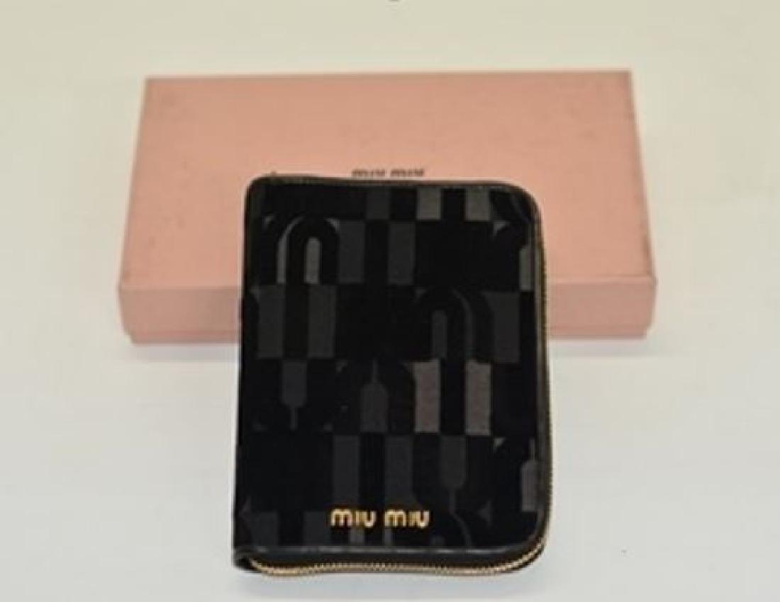 New Miu Miu Ladies Agenda with zipper: Miu Miu New! Style: Ladies Agenda with zipper ST.COCCO LUX Color: black Made in Italy