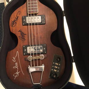 Signed Beatles Bass I: Signed by John Lennon. Paul McCartney, George Harrisson and Ringo Starr