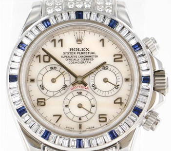 Rolex Daytona Diamond Bezel Watch: Men's Rolex Automatic Daytona 16519 Calibre - 4030 Case Size- 40mm Material - Solid White Gold Crown/Case Back - Screw Down Shape - Round Bezel - Diamonds Analog Power Reserve - 72 /hrs Dial Color - W