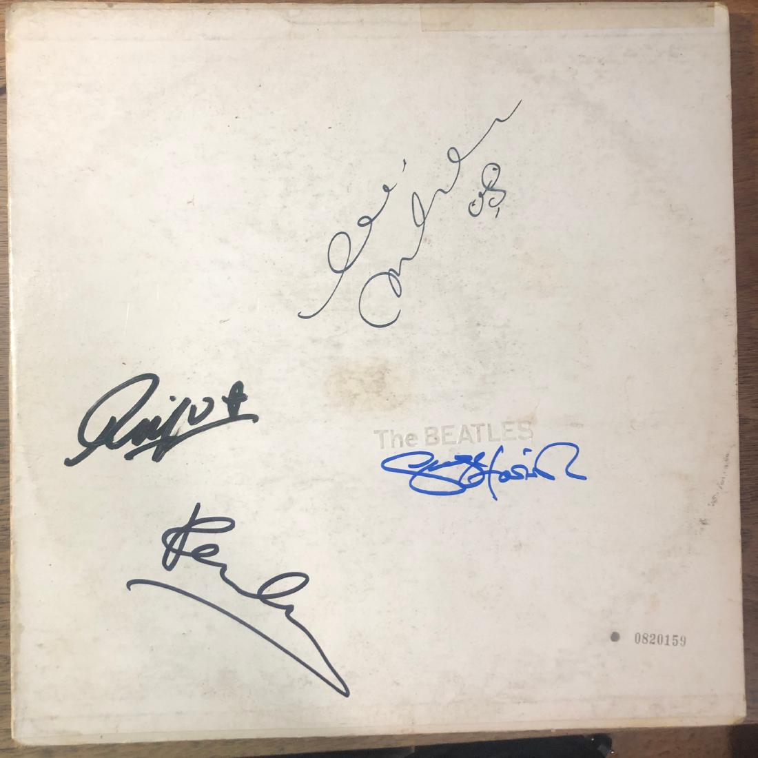 Signed Beatles White Album Album: Signed by John Lennon. Paul McCartney, George Harrisson and Ringo Starr