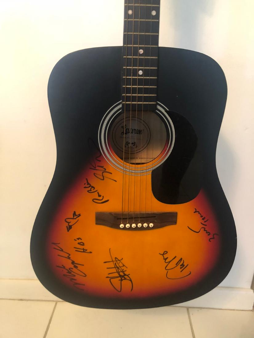 Signed Tom Petty & The Heartbreaker Guitar: Signed by Tom Petty, Mike Campbell, Ron Blair, Stan Lynch, and Benmont Tench