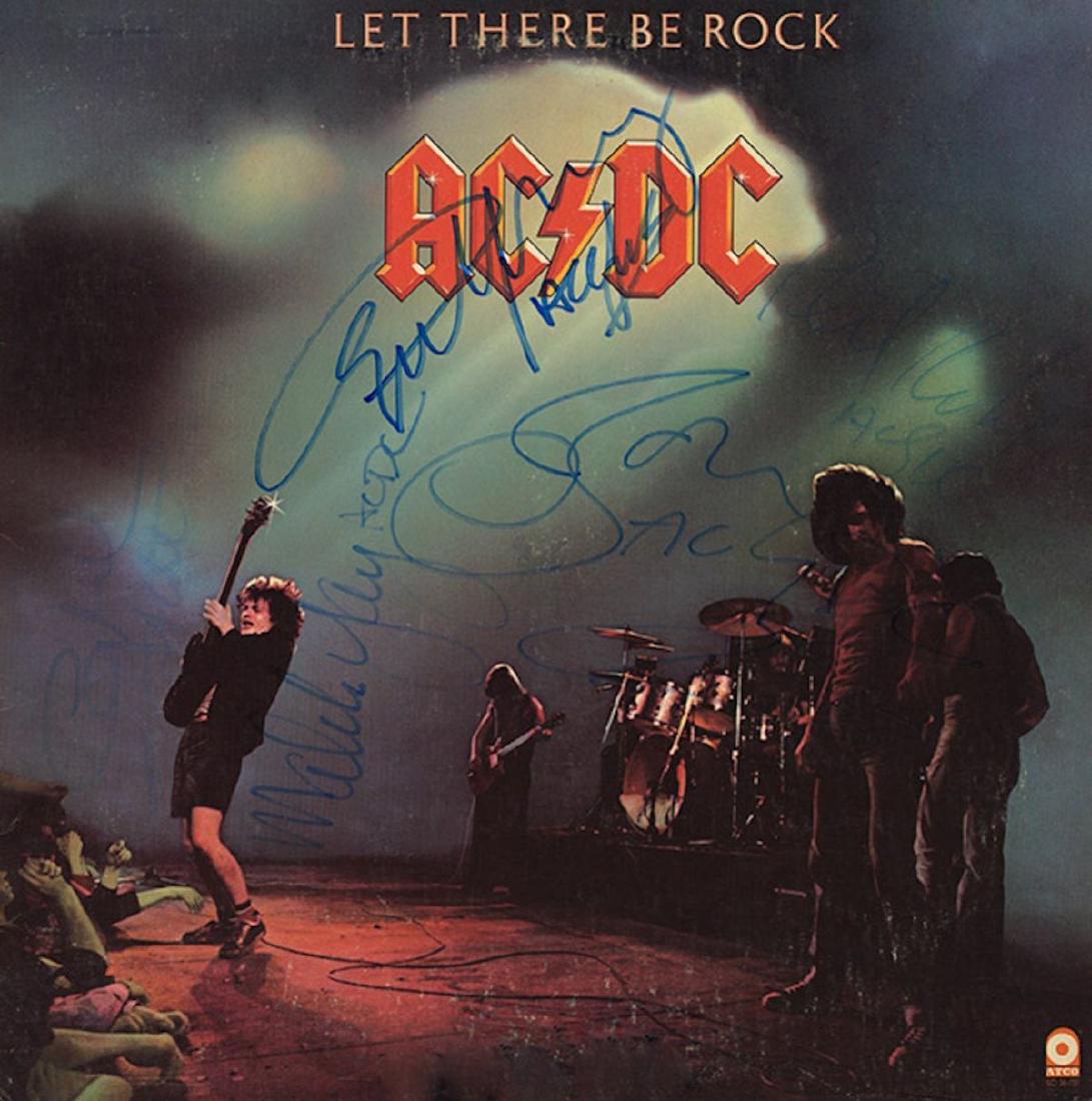 Signed AC/DC Let There Be Rock - Bon Scott: Signed by Bon Scott, Angus Young, Malcolm Young, Cliff Williams, and Phil Rudd