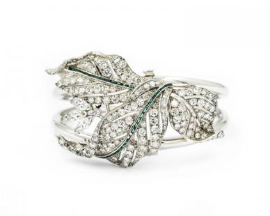 Emerald Diamond Bracelet: Style: Art Deco Description: Platinum Diamond and Emerald Model: RARE Cuff Bracelet /Clip Materials: platinum Weight: 55.6dwt/86.46g; Stone count/info: 200 European cut diamonds = 13.50cts; Length: 6