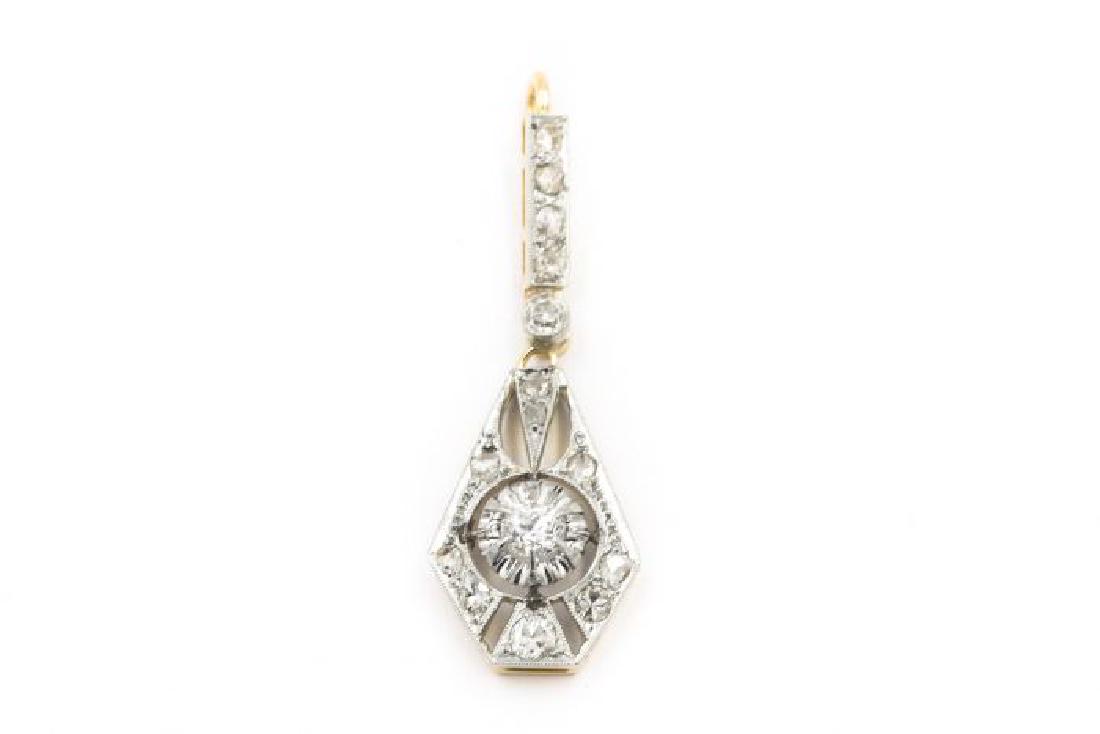 Diamond Pendant: Style: Art Deco Description: Yellow Gold and Diamond Model: Pendant; Materials 14k yellow gold; 1.1dwt/1.71g; Stone Count:15 round diamonds = 0.40cts; 1 1/16" Condition: Gently Loved/Vintage/Art Deco