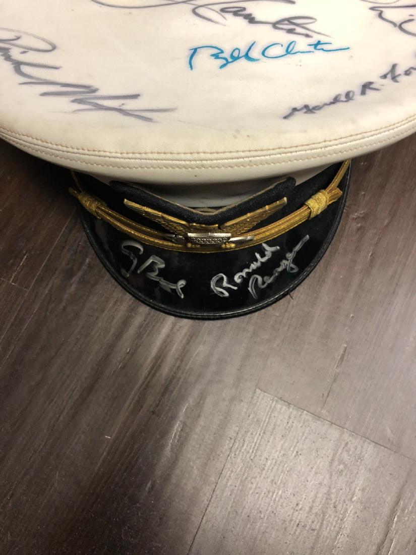 Signed President/Military Icons Hat: Signed by George Bush Sr., George Bush Jr, Jimmy Carter, Bill Clinton, Richard Nixon, Gerald Ford, Oliver North and Norman Schwarzkopf. This hat comes in an acrylic display case