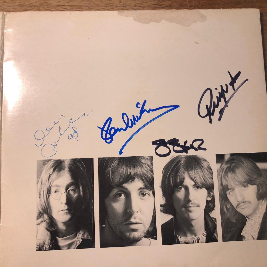 Signed Beatles White Album: Signed by John Lennon. Paul McCartney, George Harrisson and Ringo Starr