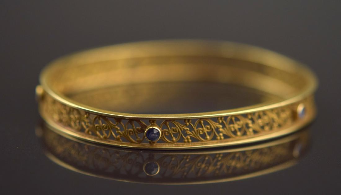 Gold and Sapphire Filigree Bangle: Victorian Yellow Gold and Sapphire Filigree Bangle ; 14K yellow gold; 5 sapphires = 0.50cts; 7.8dwt/11.9g; 7.5"