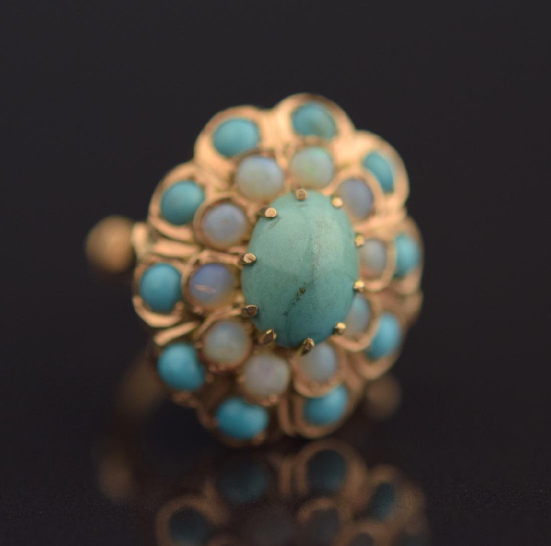 Victorian Gold Gemstone Ring: Victorian Gold Gemstone Ring; 14k Yellow Gold; Victorian; 6.7 grams/4.3dwt; Turquoise: 1 Oval 10x8mm, 10 round 3.50mm each; 10 Round Australian Opals=3.30mm each; 34mm; Size 5 Â¾.