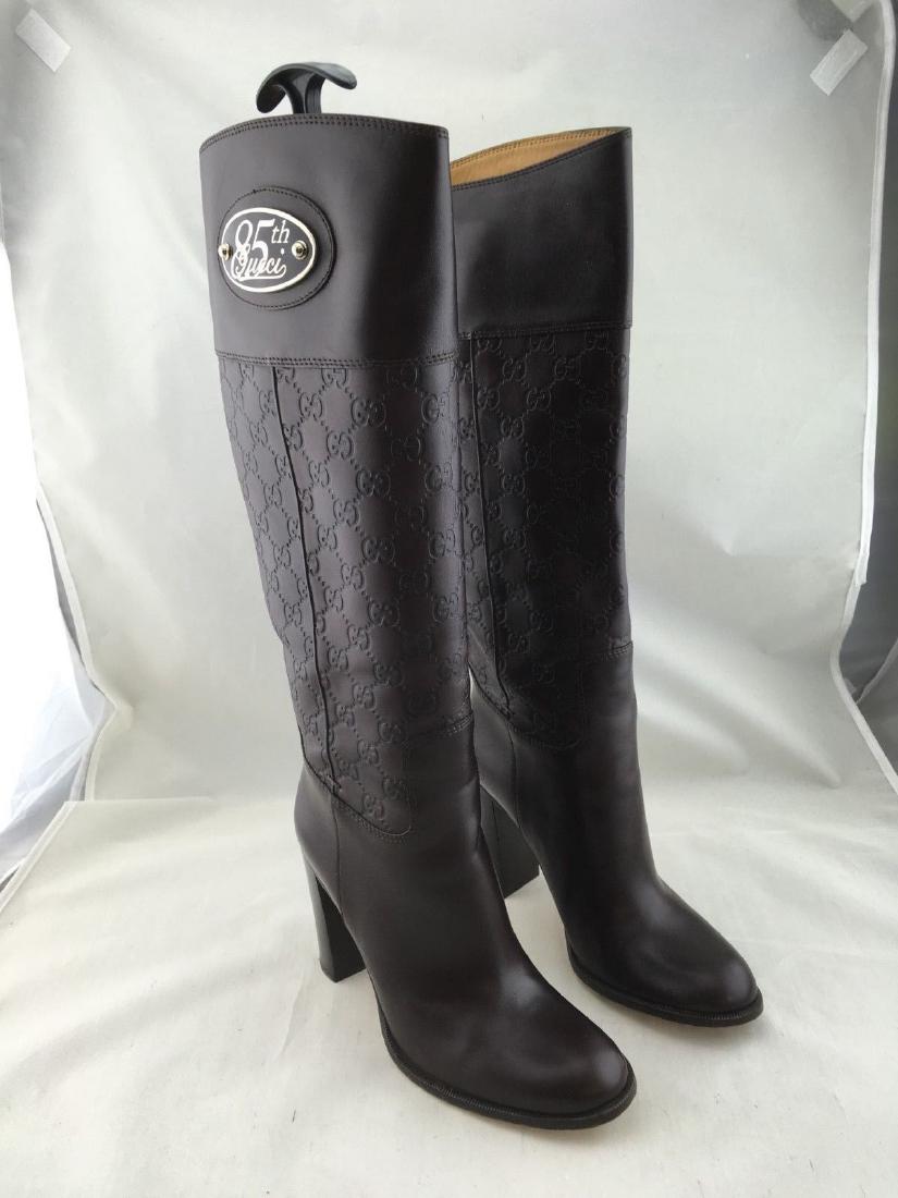 GUCCI guccisima boots (7.5 B): Brand:Gucci Theme: 85TH anniversary Made of : brown leather monogram Model: Guccisima boots SIZE 7.5 B Condition: Gently Loved/Excellent Color:Brown Width:M Made in Italy Style:Mid Calf US Shoe Size (