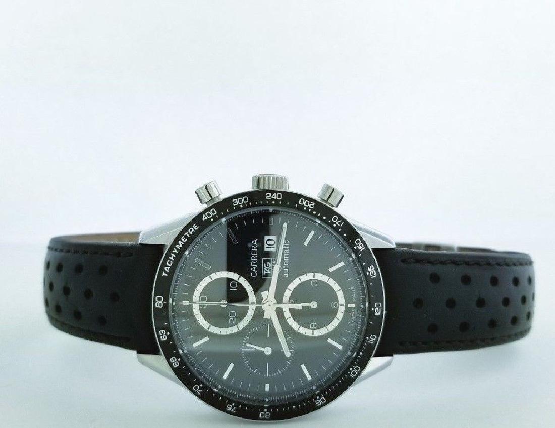 TAG Heuer Carrera CV2010.FC6233 Mens Watch: Brand: Tag Heuer Style: AG Heuer Men's CV2010.FC6233 Carrera Automatic Chronograph Watch Description: Stainless steel case with a black calfskin (perforated) leather strap. Fixed black ion-plated beze