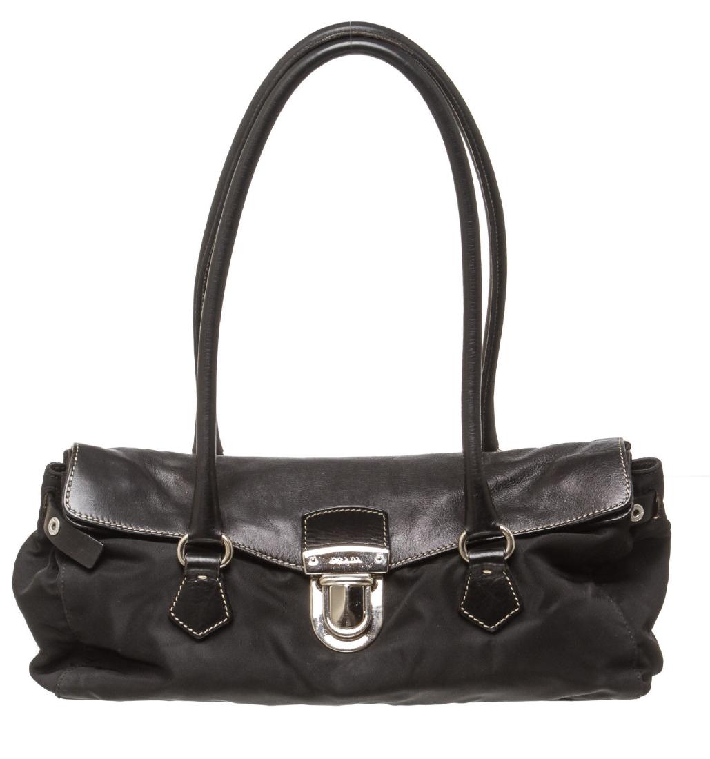 Prada Bag: Brand: Prada Style: Shoulder Bag Condition:Gently Loved/Very Good Condition Black Nylon and Leather 11.5" x 6" x 4" Strap Drop: 8" Description: Black nylon Easy Pushlock bag that features dual black r