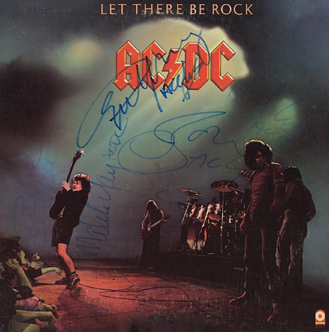 Signed AC/DC Let There Be Rock - Bon Scott: Signed by Bon Scott, Angus Young, Malcolm Young, Cliff Williams, and Phil Rudd
