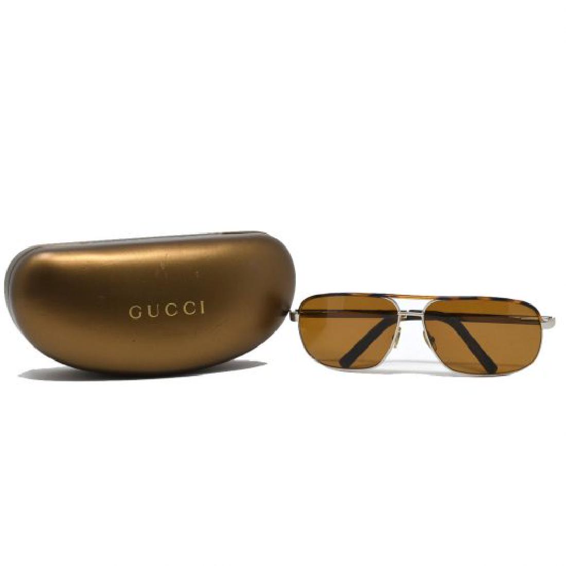 Gucci Sunglasses: Gucci GG 1857/S CCD/DB Sunglasses CompanyGucci StyleGucci GG 1857/S CCD/DB Sunglasses Frame Brown 1.77â€³ x .275â€³ ConditionLight Wear IncludesSunglasses and Glasses Box only
