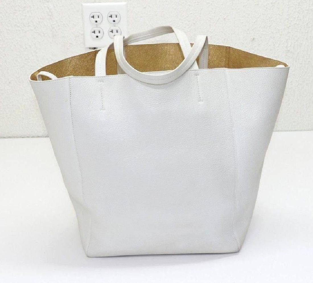 Celine Phantom Tote Calfskin Bag: Celine Phantom 113301 Medium Cabas Tote White Calfskin Gold Interior Bag Height: 13.25 Bag Length: 10.5" Bag Depth: 7.5" Strap Drop: 9.5" Good Condition 7 out 10 Normal Wear and Tear Co